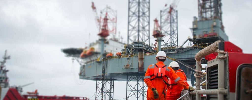 Adobestock mensen werken olie gas exxonmobil klimaatbeleid