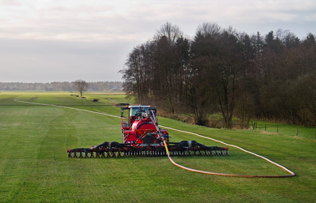 Land weiland mest machine tractor