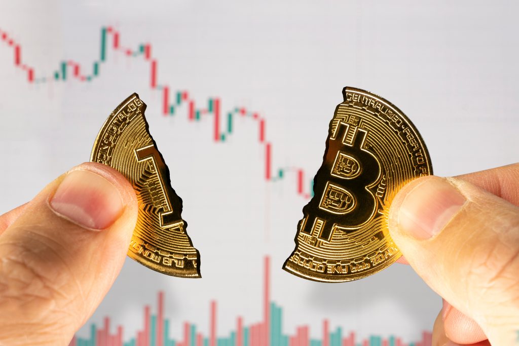 Bitcoin gebroken koers daalt duimen