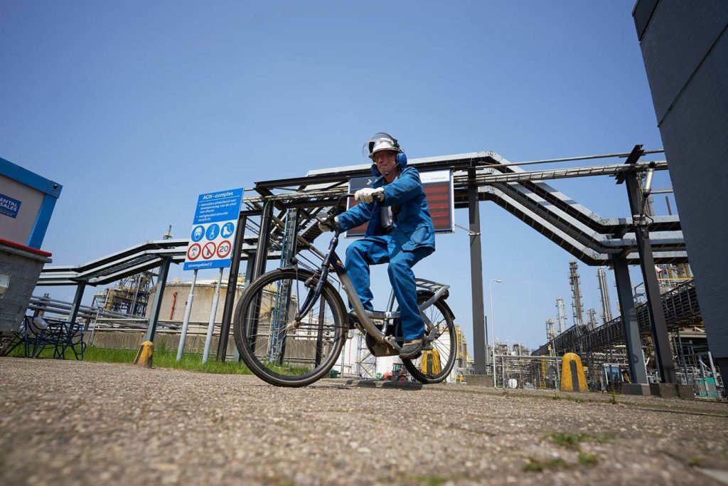 Anqore employee on bike